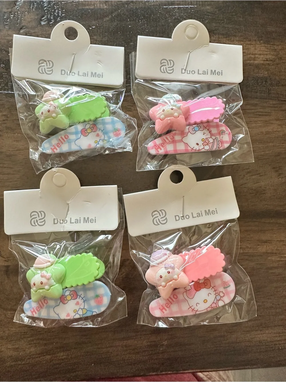 NWT Set of 4 Hello Kitty Child Size Hair Clips Barretts Pink Blue & Green